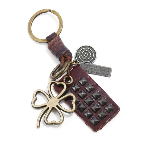 Porte-clés Vintage en Cuir de Vachette Tressé à la Main Pendentif Trèfle à Quatre Feuilles Alliage Anneau Clé Punk Rétro Bijoux