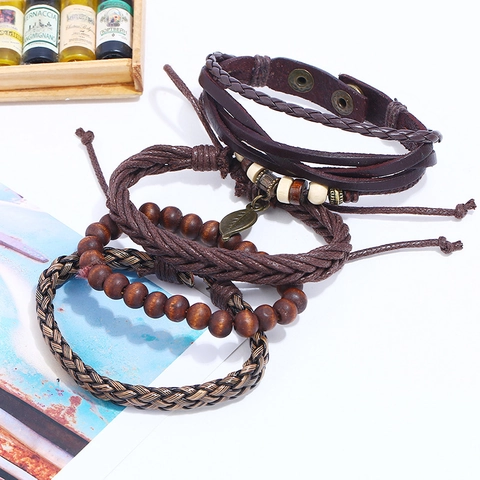 Set Bracciale in Pelle Intrecciata Vintage da Uomo Punk Bohemien Multistrato Ciondolo a Foglia Perline in Legno Cordino Regolabile
