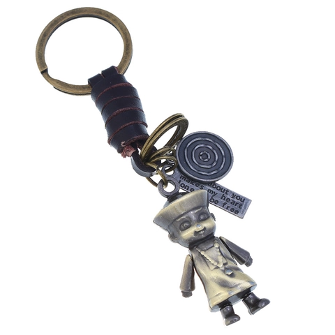 Porte-clés en Cuir de Vachette Tressé Rétro Punk Pendentif Robot Zombie en Alliage Étiquette Gravée Bijoux de Sac