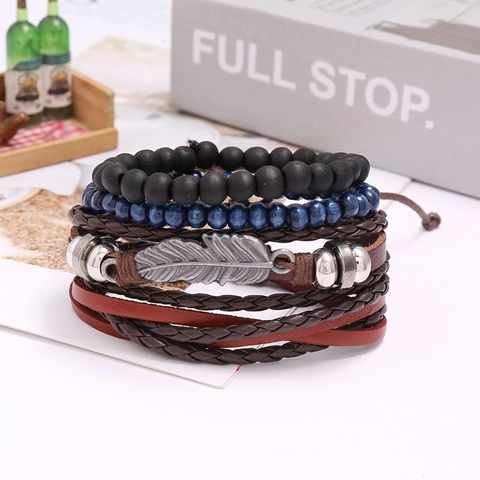 Set di Bracciali in Pelle di Vacchetta Intrecciata Retrò per Uomo Bohemian Ciondolo a Piuma in Lega Multistrato Gioielli Regalo