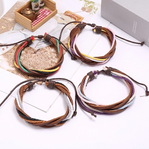 Bracciale in Pelle di Vacchetta Intrecciato a Mano Bohemien Retro Multicolore Corda di Canapa Multistrato Regolabile Stile Etnico Gioielli Unisex Regalo