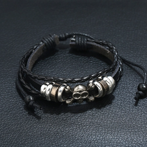 Bracciale Vintage Punk da Uomo in Pelle Intrecciata Multistrato con Teschio Regolabile con Perline Hip Hop Gotico Gioielli