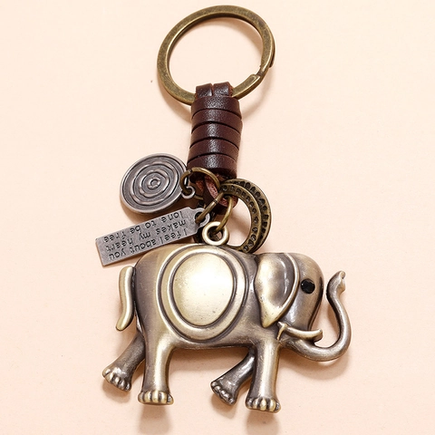 Porte-clés Éléphant en Cuir de Vache Tressé Rétro Pendentif Éléphant en Alliage de Bronze Avec Plaque de Citation en Cœur