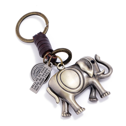 Porte-clés Éléphant en Cuir de Vache Tressé Rétro Pendentif Éléphant en Alliage de Bronze Avec Plaque de Citation en Cœur