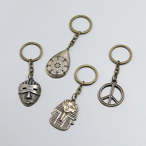 Ensemble de Porte-clés en Alliage de Bronze Vintage Signe de Paix Masque Pharaon Pendentif Mandala Anneau de Clé Cadeau