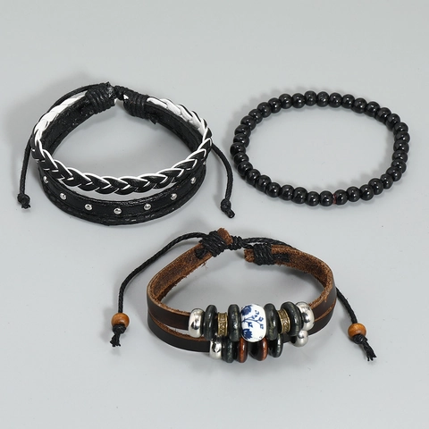 Set di Braccialetti Intrecciati Multistrato in Pelle Artificiale Vintage per Uomo Donna Stile Punk Borchie Lega Perline Legno Gioielli