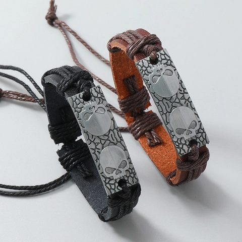 Bracciale in Pelle Artificiale Intrecciata a Mano Punk Retrò Piastra in Lega Teschio Polsino Regolabile per Uomo Donna