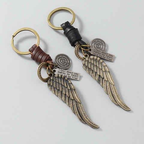 Portachiavi Vintage in Pelle di Vacchetta Intrecciato a Mano Ciondolo Ala di Piuma Retro Portachiavi per Donna Uomo Regalo Gioielli Accessori
