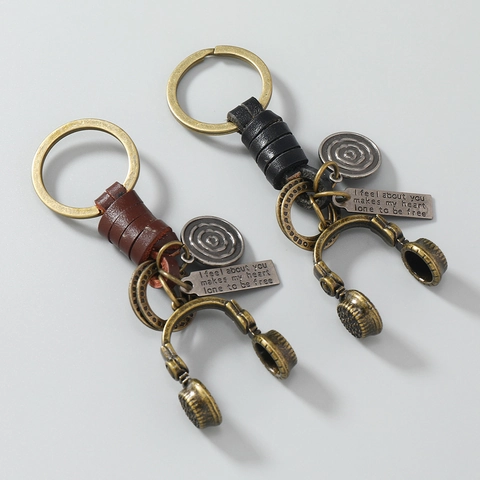 Vintage Hand Woven Cowhide Keychain With Retro Bronze Headphone Pendant Creative Leather Key Ring For Music Festival Gift