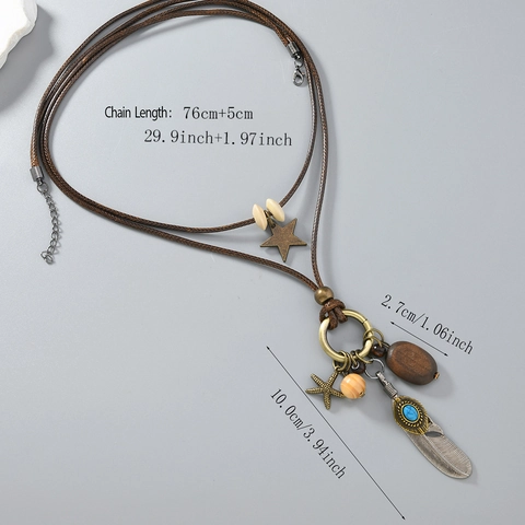 Collana Lunga Boho con Ciondolo a Piuma e Stella Vintage Stile Etnico Lega Cordino Cerato Perline Legno Turchese Artificiale