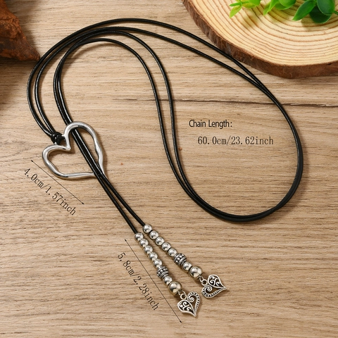 Collana con Ciondolo a Cuore Vintage Bohemien Regolabile in Pelle PU Nera Catena Lunga Nappine con Perline Gioielli Donna