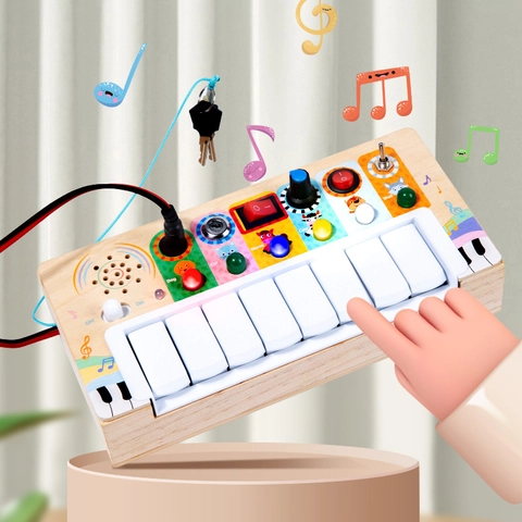 Montessori Busy Board in Legno per Bambini Piccoli Pannello Interruttore Luce LED Giocattoli Sensoriali Giocattolo di Allenamento Abilità Motorie Fini Pianoforte Elettronico