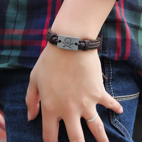 Bracciale in Pelle Intrecciata Punk Vintage con Placca in Metallo a Teschio e Fulmine da Uomo Marrone Gioielli Rock Gotico