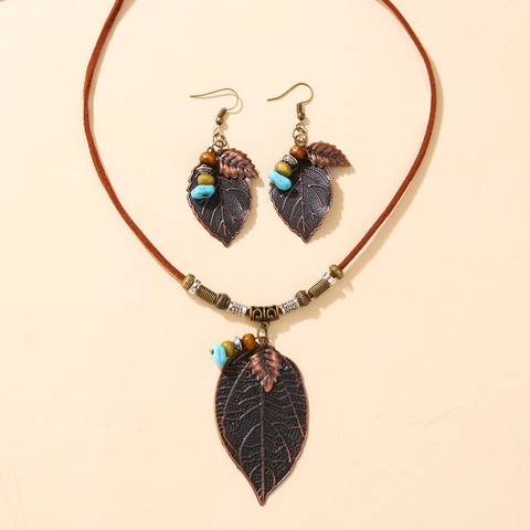 Set di Collana e Orecchini con Ciondolo a Foglia Cava Etnico Bohémien Vintage in Lega Perline di Legno e Turchese Artificiale per Donna