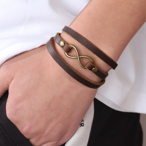 Bracciale a Fascia in Vera Pelle Fatto a Mano Vintage per Uomo Simbolo Infinito Lega di Bronzo Regolabile con Bottone a Pressione