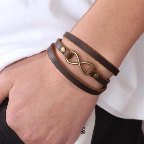 Bracciale a Fascia in Vera Pelle Fatto a Mano Vintage per Uomo Simbolo Infinito Lega di Bronzo Regolabile con Bottone a Pressione