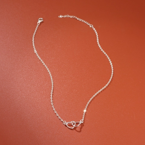 Collana Minimalista in Acciaio al Titanio con Pendente a Doppio Cuore Intrecciato da Donna Elegante Catena della Clavicola Argento Gioielli