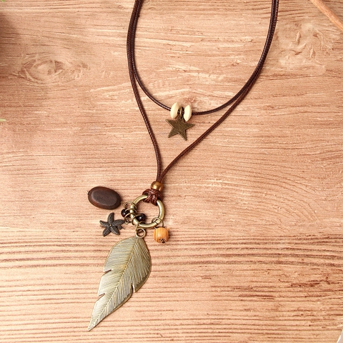 Collana Doppia Retro Boho con Ciondolo a Piuma Vintage in Lega Foglia Stella Marina Stella Lunga Catena Maglione Unisex Gioielli