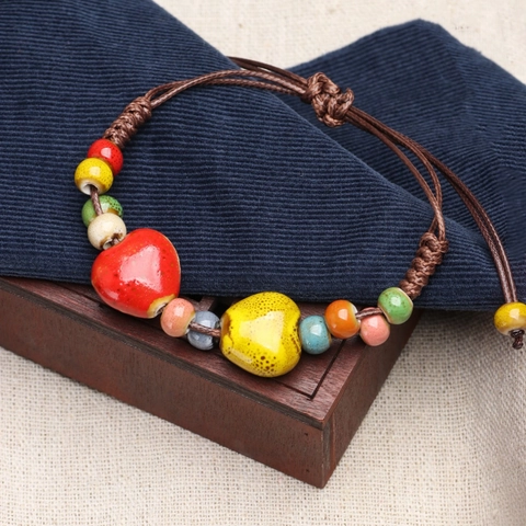 Bracelet Ethnique Rétro en Céramique Fait Main avec Perles de Cœur Bracelet Corde Tissée Ajustable Multicolore Bijoux Femme
