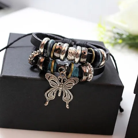 Bracciale a Farfalla Vintage Multistrato in Pelle di Vacchetta per Uomo Donna Cordino con Perline Tessuto a Mano Gioielli Boho Regolabili