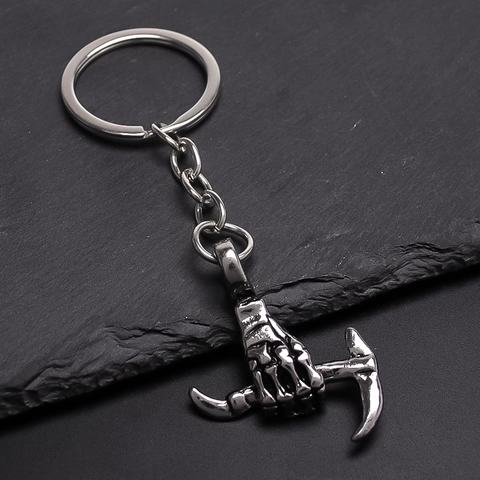 Porte-clés Punk Gothique Main de Squelette Tenant une Pioche Pendentif d'Excavatrice en Alliage Argent Vintage Accessoire de Porte-clés Créatif