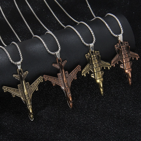 Collier Pendentif Chasseur en Acier Inoxydable et Alliage Modèle d'Avion Coulissant Bijoux Hip Hop pour Hommes et Femmes Style Militaire