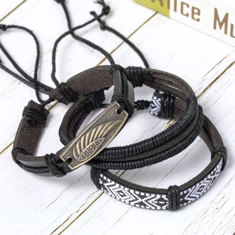 Set bracciali vintage pelle intrecciata multistrato con ciondolo ala Gioielli boho fatti a mano con cordino regolabile per uomo e donna