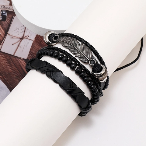 Bracciale in Pelle da Uomo Retro Combinazione Multistrato Cordino Intrecciato Ciondolo a Piuma Perline Nere Punk Gioielli di Moda Cinturino Regolabile
