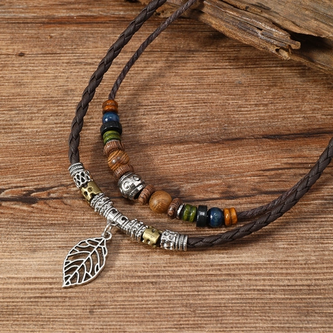 Collana Bohémien Vintage a Doppio Strato in Corda Intrecciata Con Perline in Legno Pendente a Foglia Regolabile per Uomo Donna