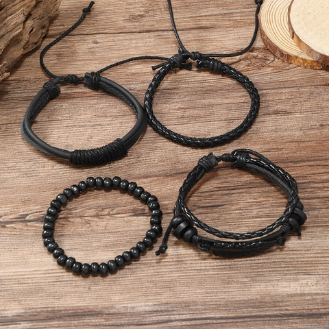 Braccialetti in Pelle Intrecciata da Uomo Vintage Ciondolo a Piuma in Lega Retro Punk Regolabile Cordino Multistrato Gioielli