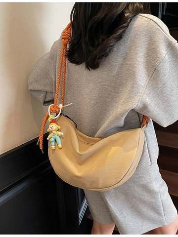 Women Canvas Shoulder Bag Minimalist Dumpling Crossbody Bag Fashion Knotted Rope Strap Casual Travel Tote With Cartoon Doll