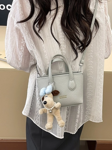 Borsa a Secchiello da Donna in Pelle PU con Trama Litchi Borsa a Tracolla Versatile Con Simpatico Ciondolo Cane in Peluche Collezione Primavera