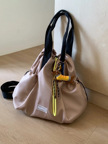 Waterproof Nylon Drawstring Backpack For Women Fashion Lightweight Large Capacity Tote Bag With Cute Dog Charm Travel Shoulder Bag