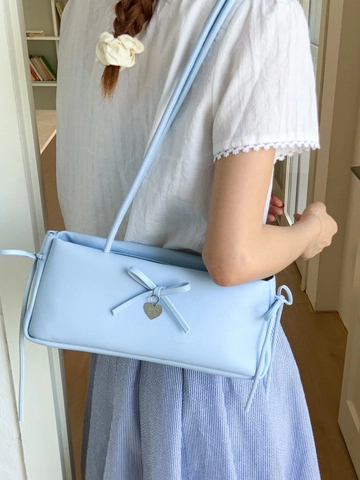 Bolso de Axila de Cuero PU Dulce para Mujer Con Cinta de Lazo Y Colgante de Corazón Bolso de Hombro Minimalista Coreano Color Sólido