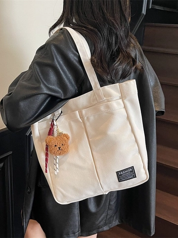 Women Large Capacity Canvas Tote Bag With Cute Bear Pendant Fashion Commuting Shoulder Bag Multi Pocket Solid Color Casual Handbag