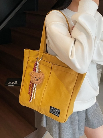 Women Large Capacity Canvas Tote Bag With Cute Bear Pendant Fashion Commuting Shoulder Bag Multi Pocket Solid Color Casual Handbag