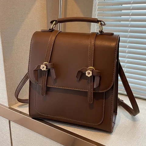 Mochila de Cuero PU para Mujer Estilo Británico Retro Bolso de Mano Multifuncional Con Lazo y Hebillas de Flores para Escuela y Diario