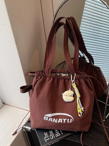 Women Large Capacity Nylon Drawstring Backpack Tote Bag Casual Letter Print Shoulder Bag With Plush Pendant For Daily