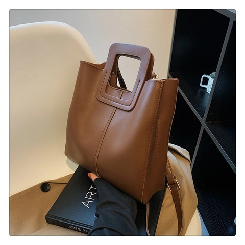 Damen Retro PU Leder Tote Handtasche Quadratischer Hohler Griff Verstellbarer Riemen Große Kapazität Pendler Umhängetasche