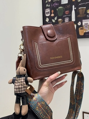 Borsa a secchiello in pelle PU retrò per donna borsa a tracolla alla moda in stile coreano con tracolla larga etnica e ciondolo a coniglio