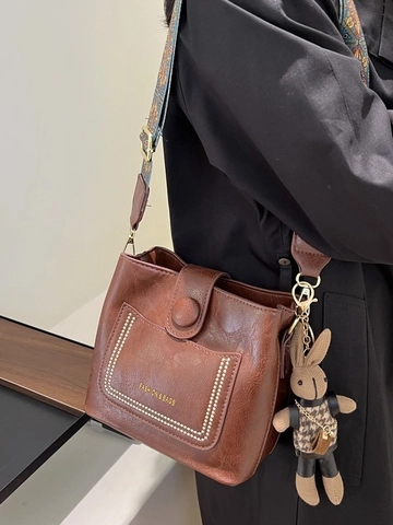 Borsa a secchiello in pelle PU retrò per donna borsa a tracolla alla moda in stile coreano con tracolla larga etnica e ciondolo a coniglio