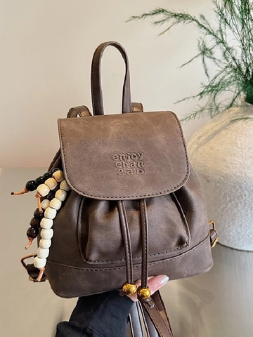 Vintage Fashion PU Leather Backpack For Women Minimalist Debossed Letter Flap Drawstring Mini Backpack With Wooden Beads Decoration