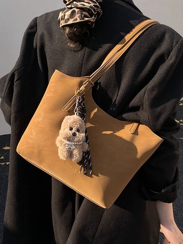 Damen PU Leder Tragetasche Mit Großer Kapazität Retro Eimer Stil Umhängetasche Mode Buchstaben Druck Mit Plüsch Anhänger Pendler Tasche
