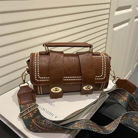 Sac Boston en Cuir PU Rétro pour Femmes Avec Rivets Bandoulière Large Géométrique Sac à Main Cylindrique Grande Capacité Sac Bandoulière