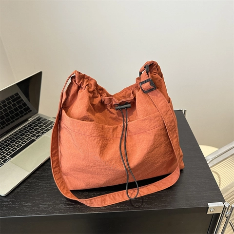 Large Capacity Nylon Drawstring Bucket Bag For Women Trendy Casual Crossbody Shoulder Bag With Stitching Plush Pendant