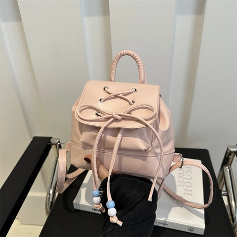 Damen Mini PU-Leder Rucksack Mit Schleifenknoten Kordelzug Design Modische Klappe Kleine Handtasche Casual Urban Schultasche