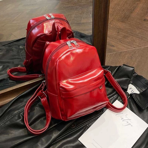 Damen Mini Mode PU Leder Rucksack Glänzende Ölhaut Einfarbig Kleiner Daypack Urban Casual Rucksack Zum Pendeln