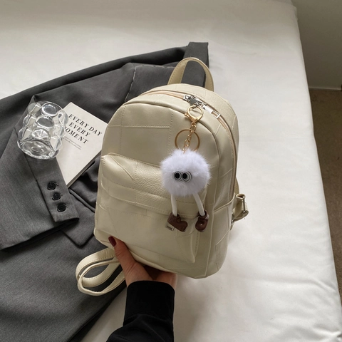 Sac à Dos de Mode en Cuir PU Patchwork Géométrique pour Femmes Grande Capacité Sac Décontracté de Voyage avec Pendentif Monstre