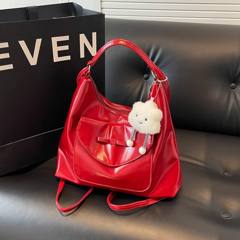 Bolso de Hombro de Cuero PU Brillante para Mujer Gran Capacidad Bolso Tote Color Sólido Con Decoración de Lazo y Colgante de Nube de Felpa Bolso de Mano de Moda
