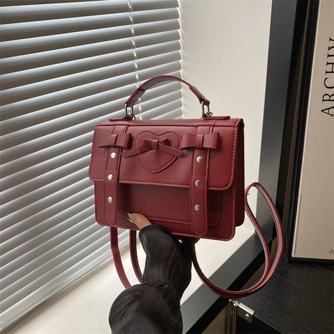 Vintage PU Leder Herz Schleife Rucksack Damen Preppy Style Umhängetasche Nieten College Schultasche